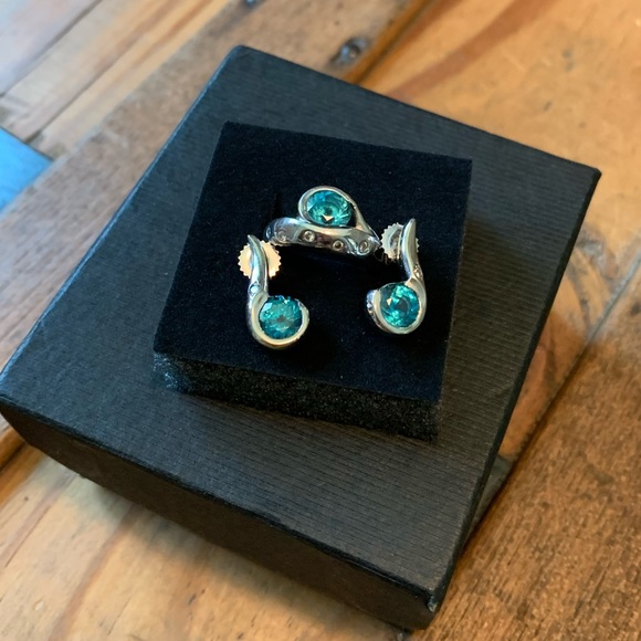Blue Zircon and diamond- accented ring and drop earrings in a platinum setting.